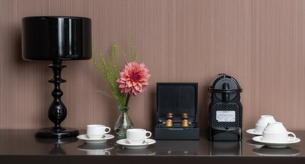 Crowne Plaza Milan City Room Type - 1 Bedroom Junior Suite with living area and sofa bed