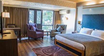 Hotel Ahdoos Room Type - Super Deluxe Room Lake View and City View