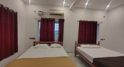 Orange and Grey Beach house Room Type - Family suite -AC 4 person