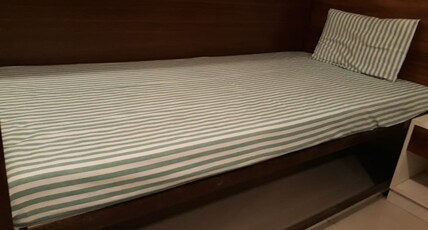 Kubera Dormitory | Beds in a Hostel Room Type - NON AC Male Dorm room Single Bed with shared bathroom (Local ID and Unmarried Couples Not Allowed)