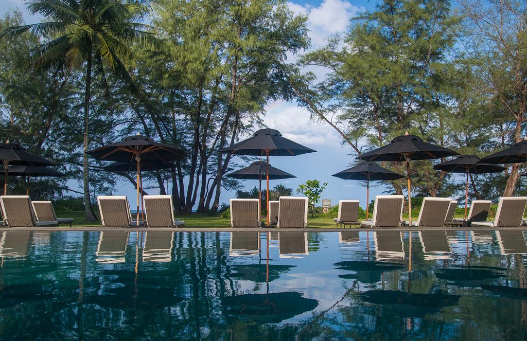 SALA Phuket Mai Khao Beach Resort - Tap to explore photos
