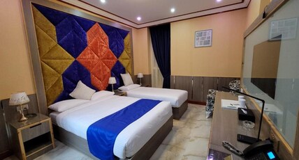 Camphor Hotel Room Type - Deluxe Triple Room