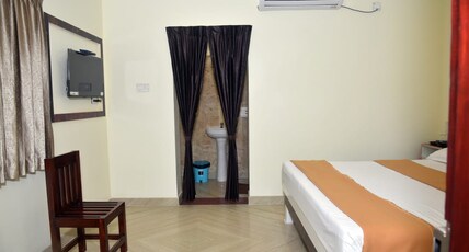 Chellam Inn Room Type - Deluxe Double Room AC