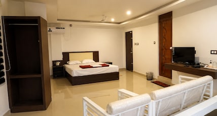 Grand Munnar Rooms Room Type - Luxury room AC room with waterfall View Grand Munnar Rooms Room Type - Luxury room AC room with waterfall View