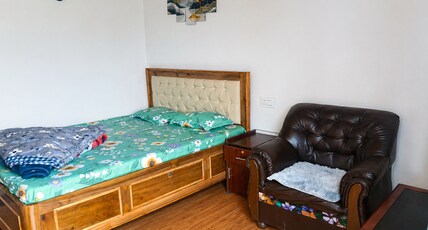 Mountain paradise homestay batashia loop Room Type - Deluxe Double Room with Balcony.