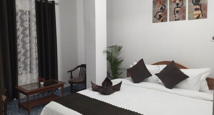 Bhanu Homestay Room Type - Deluxe Double Room (2 Adults + 1 Child)