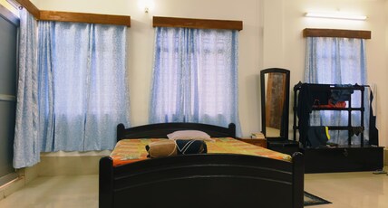 TNTR Rajnagar Room Type - Deluxe King Bed Room