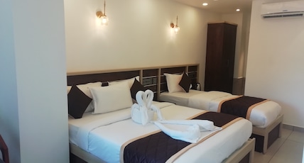 Paul Residency Nedumbassery Room Type - 1 Bedroom Family with Air Conditioning Paul Residency Nedumbassery Room Type - 1 Bedroom Family with Air Conditioning