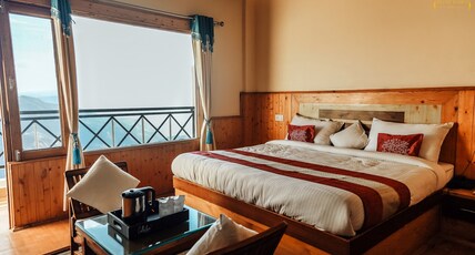 Hilltop Resort Room Type - Deluxe room with Balcony and stunning Mountain Views