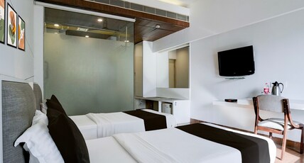 Super Collection O Limda Chowk Formerly Hotel Harmony Room Type - Deluxe with Twin Bed