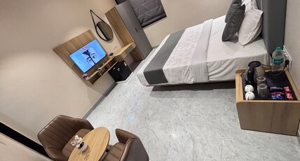 Hotel Stayvilla Raipur Room Type - Premium Room with Balcony Hotel Stayvilla Raipur Room Type - Premium Room with Balcony