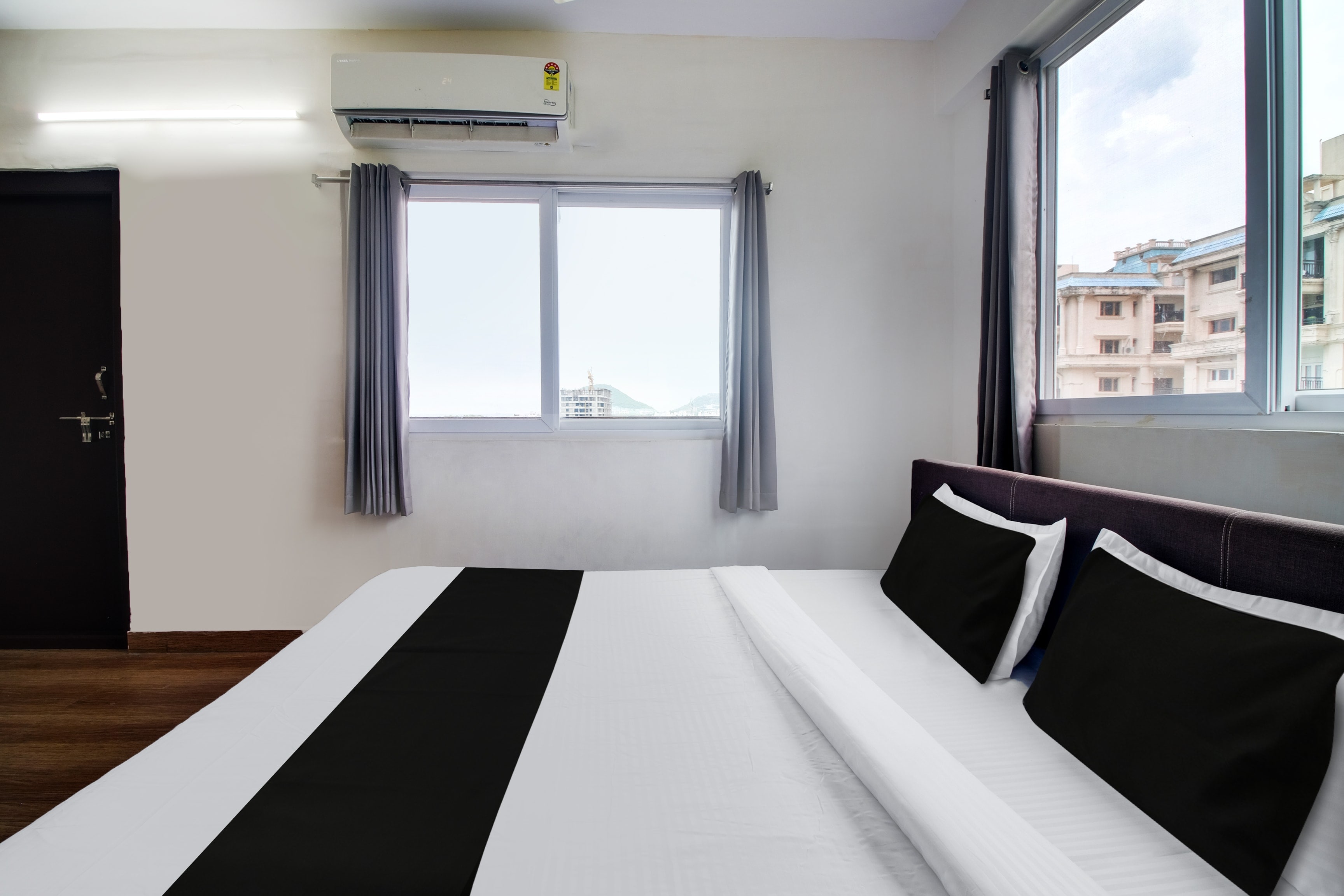 Super Hotel O Vizag IT Hill Rushikonda - Tap to explore photos