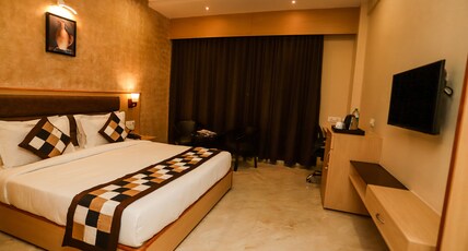 Hotel Aarunya Royale Room Type - Deluxe Room