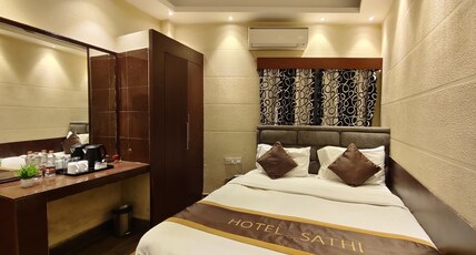 HOTEL SATHI TARAPITH Room Type - Basic Double