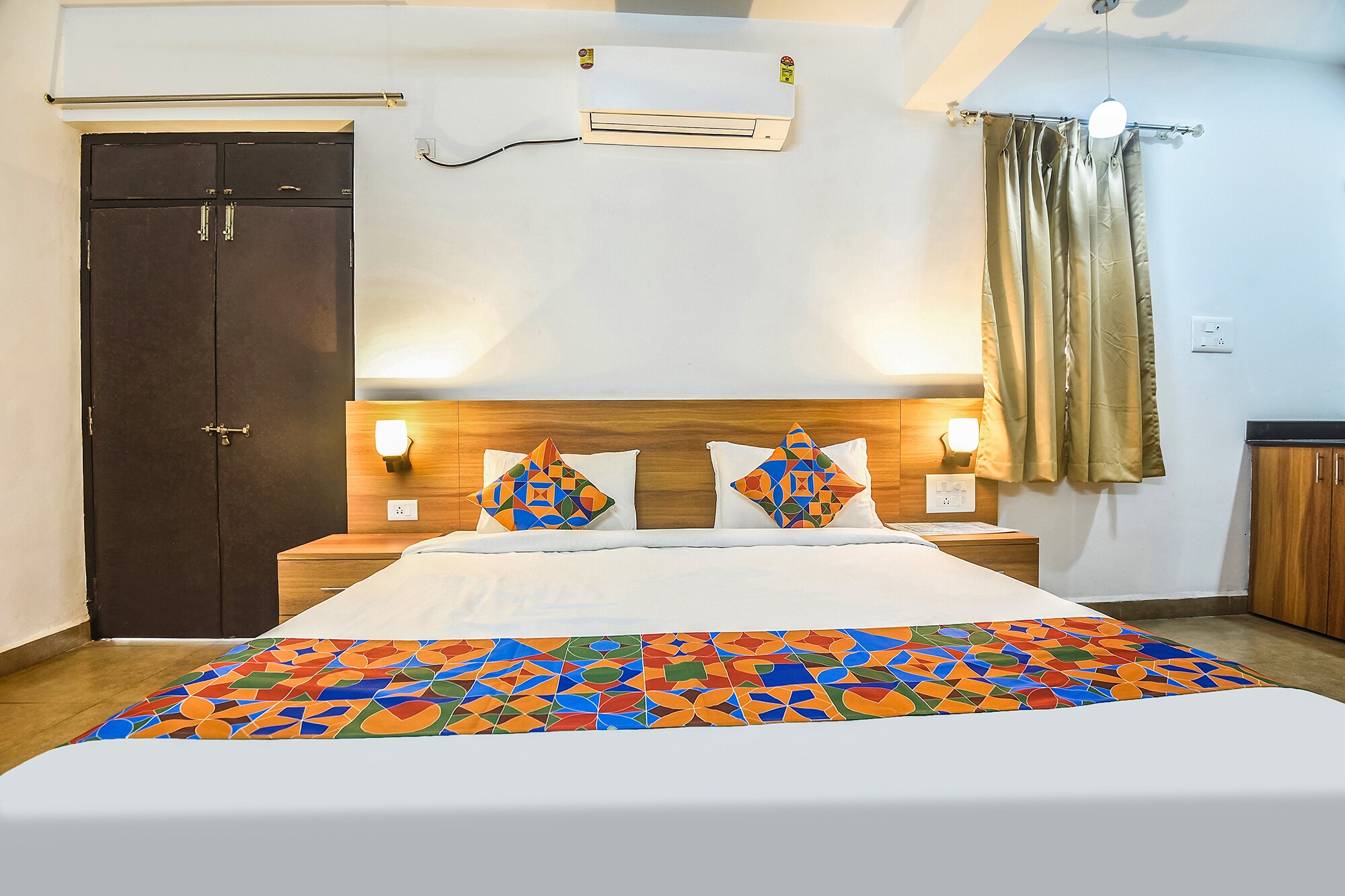 FabHotel Holiday Suites - Tap to explore photos