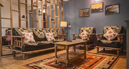 Grand Casa Room Type - Family room with mountain view and balcony