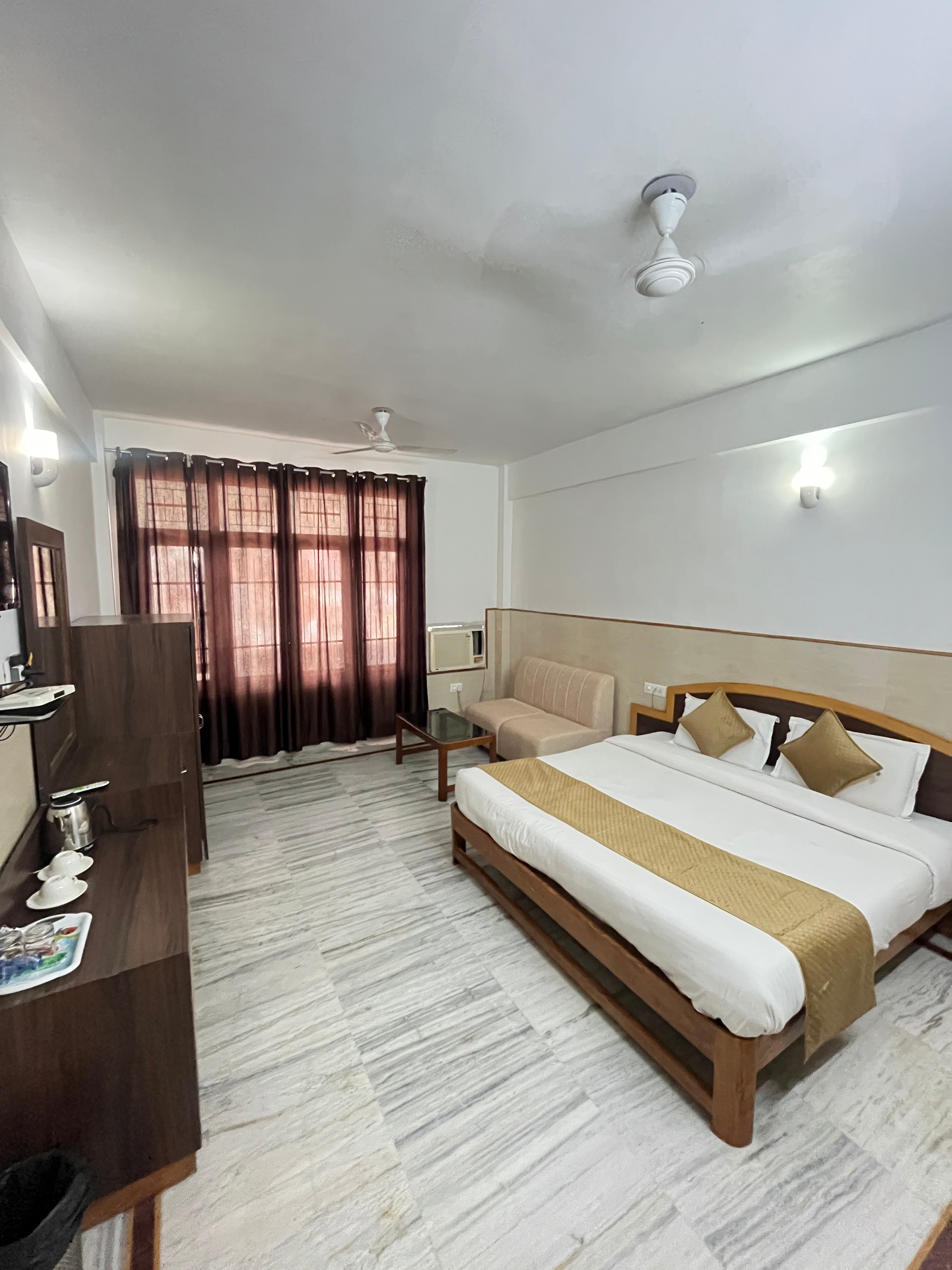 Hotel New Ashok - Tap to explore photos