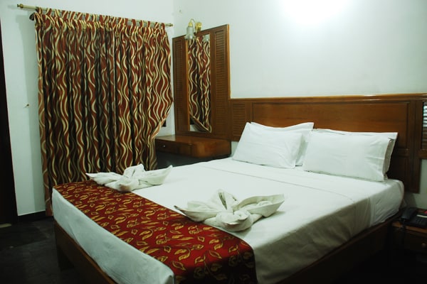 Hotel Theni International - Tap to explore photos