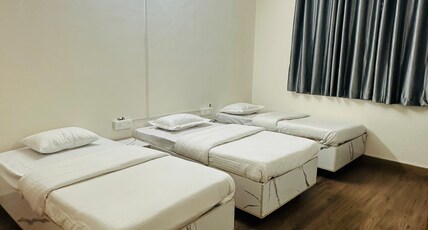 Elite stays viman nagar Room Type - Single bed in triple sharing room