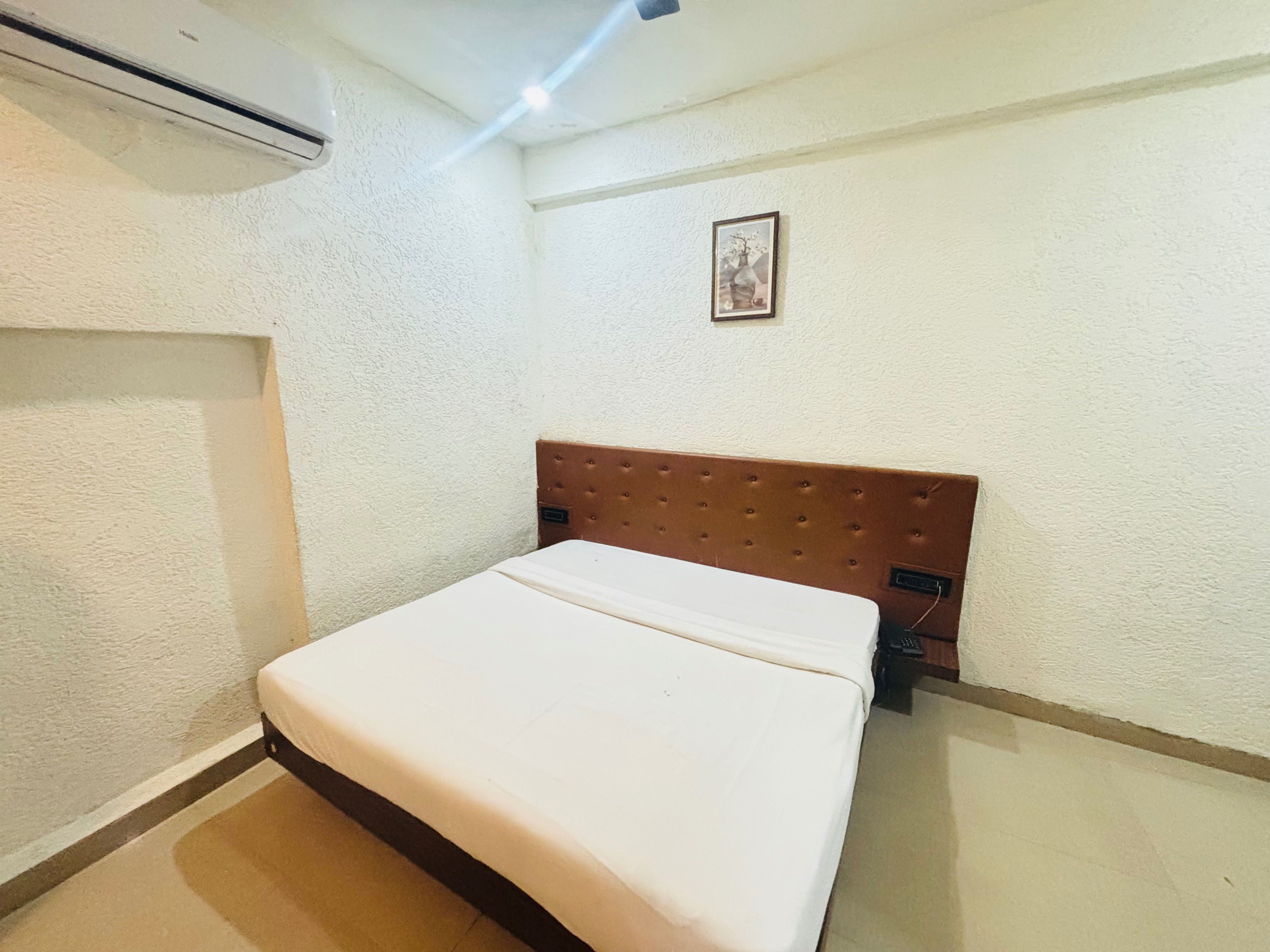 Hotel O Adarsh - Tap to explore photos