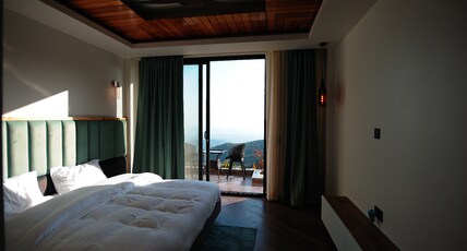 Moksham Stays Room Type - Doon Valley Facing Room with private Balcony