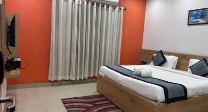 HOTEL MAYUR AND RESTAURANTS Room Type - DELUXE ROOM