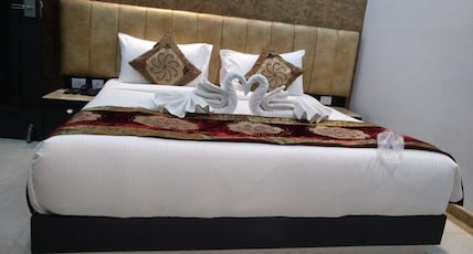 Arihant Hotel  Room Type - Deluxe room