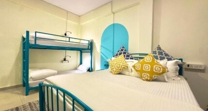 Locomo Hostel  Express - Stay Work Eat Room Type - Quadruple Room with Shared Kitchenette and Lounge