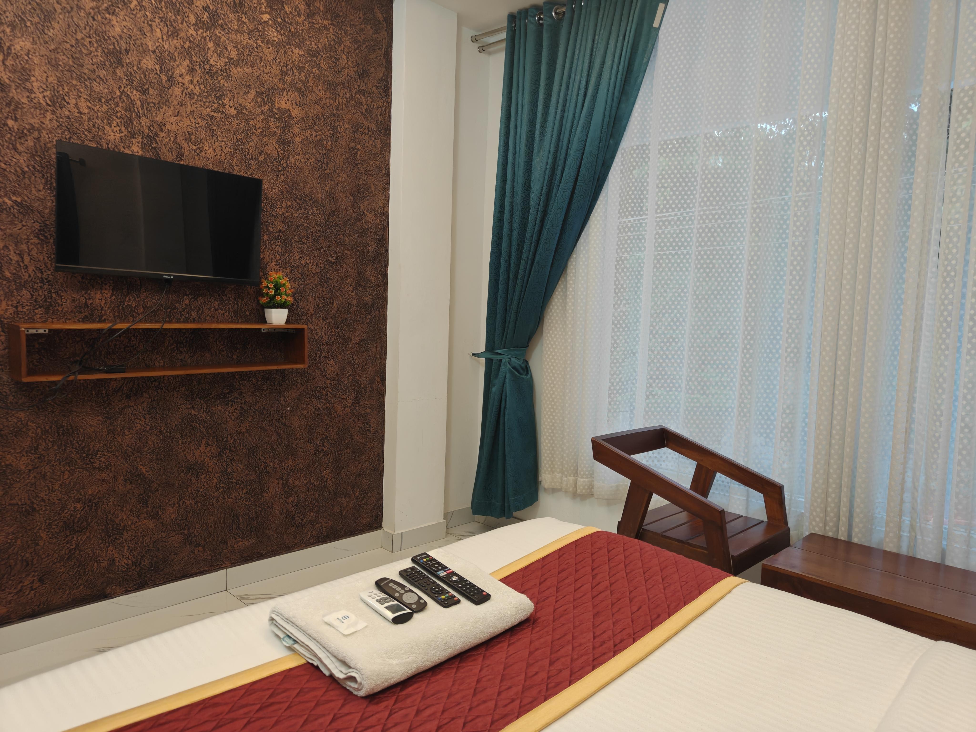 Emza Suites - Tap to explore photos