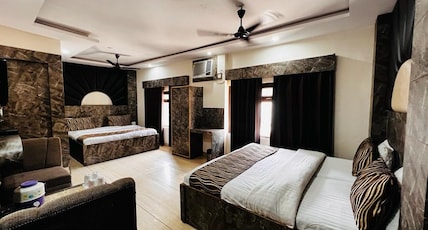 Hotel Gyan Room Type - Non Ganga Facing Four Bed Room (Single Members not allowed) Hotel Gyan Room Type - Non Ganga Facing Four Bed Room (Single Members not allowed)