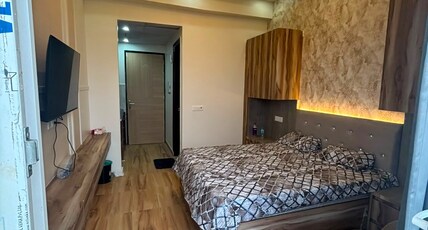 Luxury stay for Couples and guest Room Type - One-Bedroom Apartment with Balcony and City View