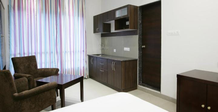Kshitij | Rooms in An Apartment Hotel - Tap to explore photos