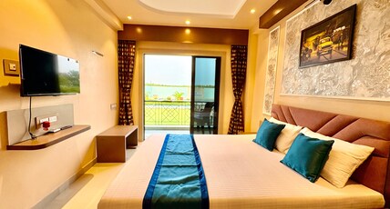 Parijat Resort Room Type - Premium Room with private balcony (First Floor) Parijat Resort Room Type - Premium Room with private balcony (First Floor)