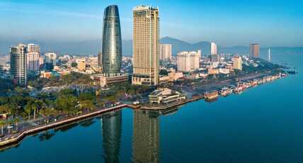 NOVOTEL DANANG PREMIER HAN RIVER Room Type - Novotel Suite, balcony, Han River view, bathtub, and Premier Lounge Access- 1 king bed, 56 m2
