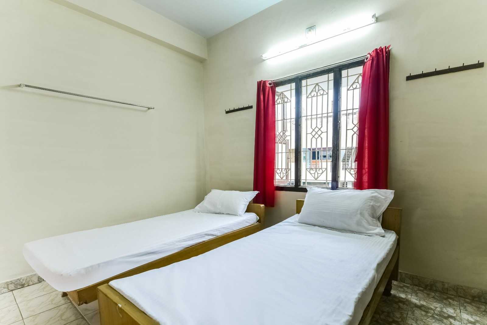 Hotel O Sakthi Guest House - Tap to explore photos