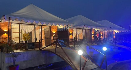 Dudhwa Palm Resort | A Serene Stay Room Type - Swiss Cottages