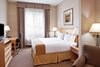 Holiday Inn Express Hotel & Suites Chesterfield - Selfridge Area Room Type - 1 King Bed Suite Comm Accessible