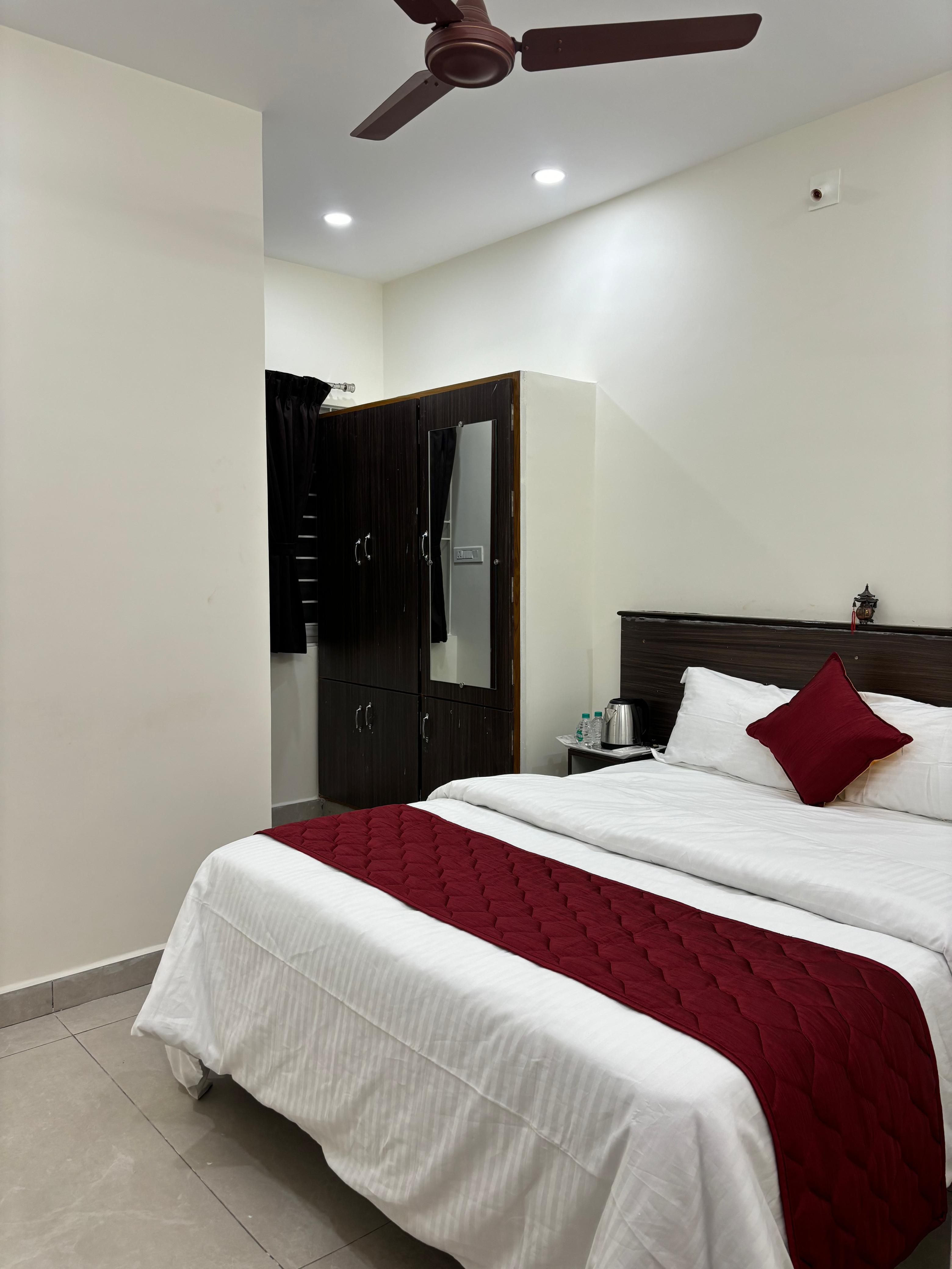 PS Elite Homestay Tirupati - Tap to explore photos