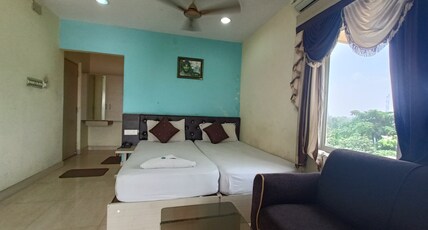 Reliance Guest House Room Type - AC Super Deluxe Room