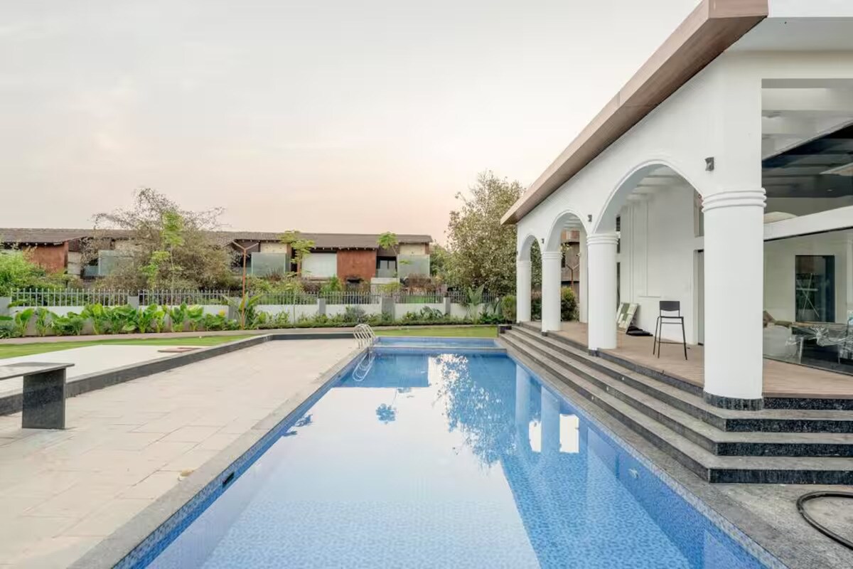 Vivid Vibes By KiwiStays | 1 BHK | Pool - Tap to explore photos