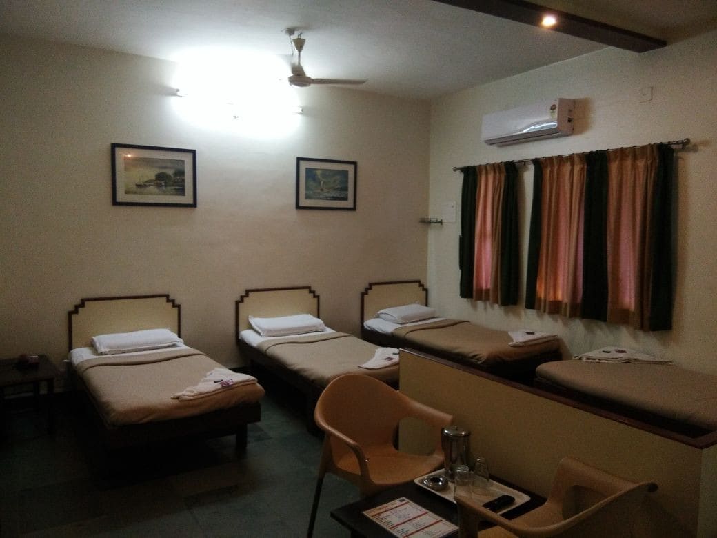 Hotel Dhanashree - Tap to explore photos