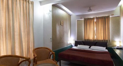 Hotel Isher International Room Type - A/C Super Deluxe Room