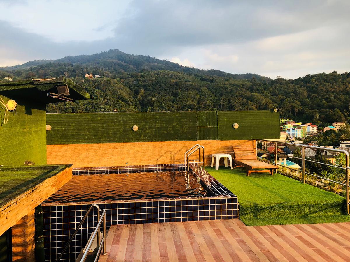 OYO 861 Patong Dynasty Hotel - Tap to explore photos