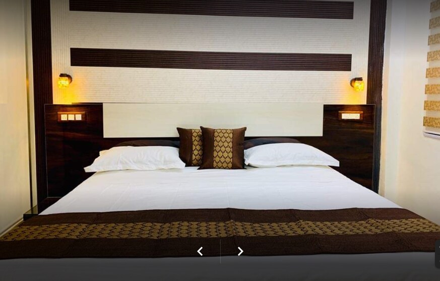 Grand Homes | 2 BHK Mountain-view Apartments - Tap to explore photos
