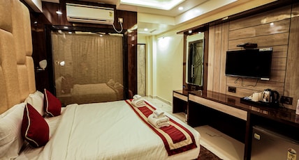 Gogol Beach Resort Room Type - Deluxe Room With Mini Fridge And balcony city view Gogol Beach Resort Room Type - Deluxe Room With Mini Fridge And balcony city view