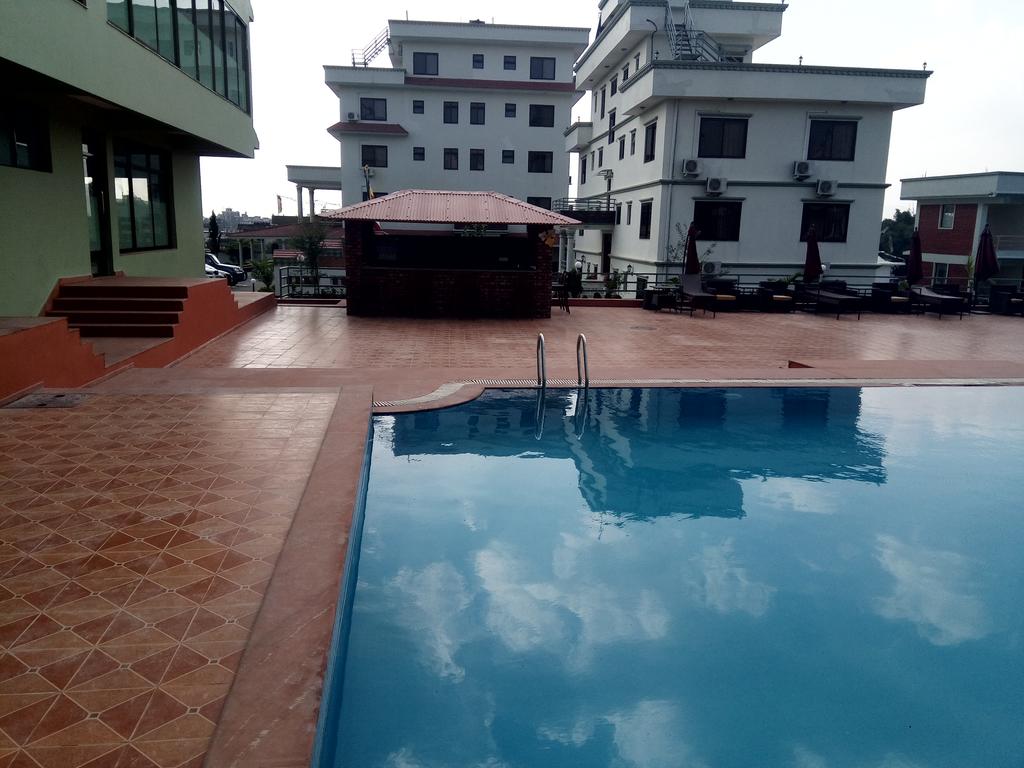 Hotel Mukhum International - Tap to explore photos