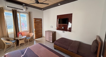 Daandikaanthi Hotel (100 Metre Walking From Maa Dhari Devi Temple Gate) Room Type - Triple Bed Deluxe Room ( Ground Floor, Garden View) Daandikaanthi Hotel (100 Metre Walking From Maa Dhari Devi Temple Gate) Room Type - Triple Bed Deluxe Room ( Ground Floor, Garden View)