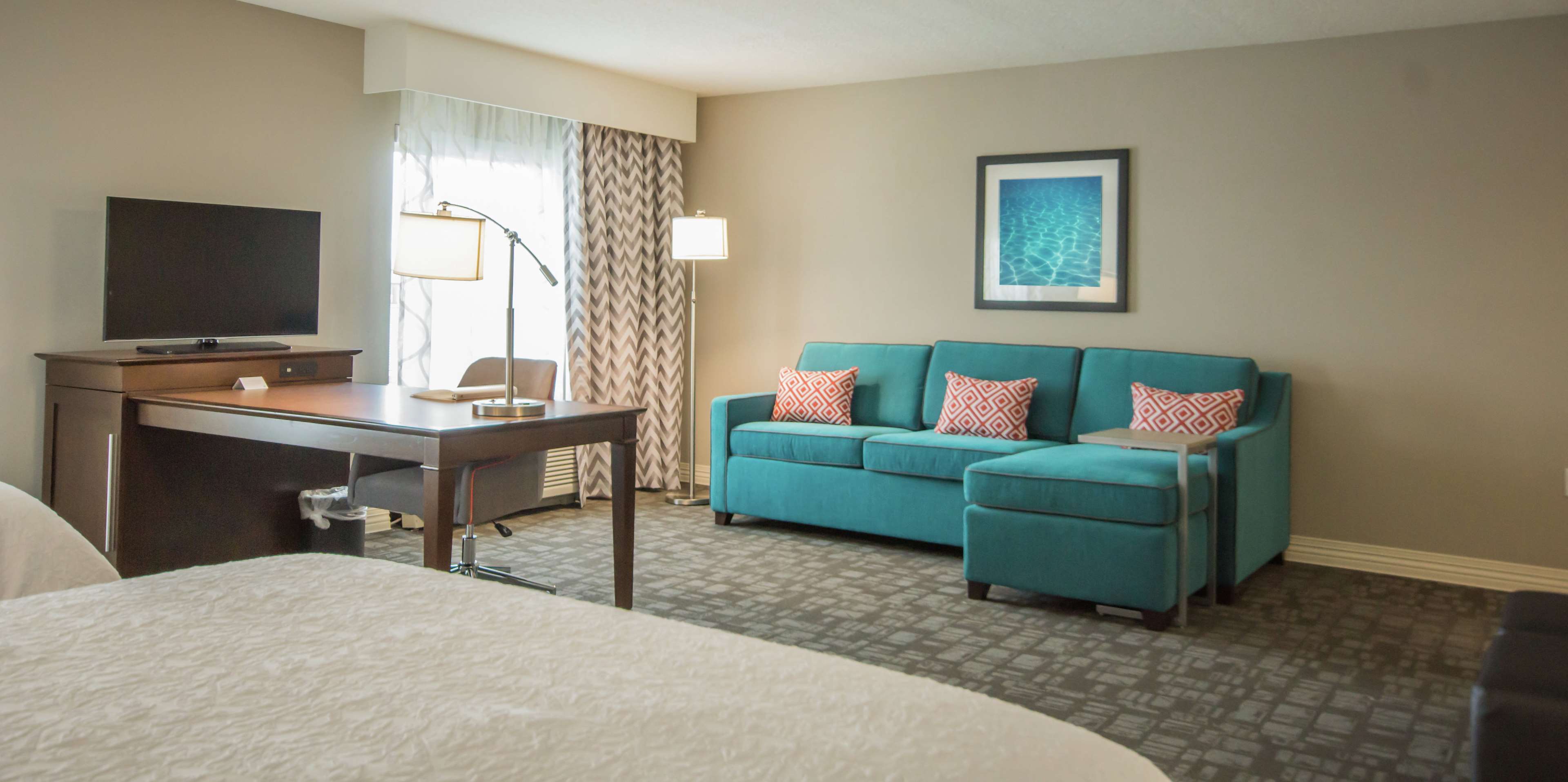 Hampton Inn & Suites by Hilton Orlando At SeaWorld - Tap to explore photos