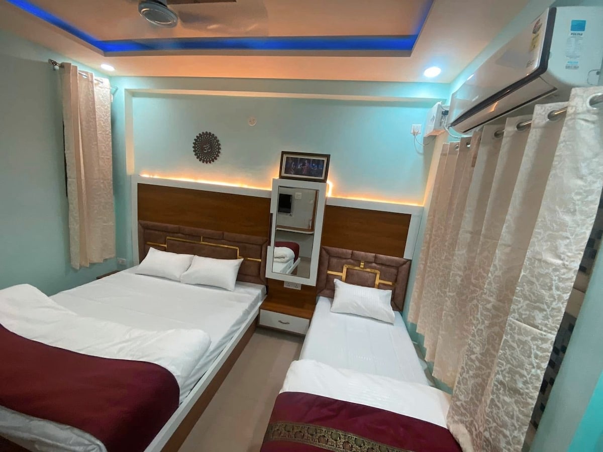 RV INN Deluxe AC Room with private bath - Tap to explore photos