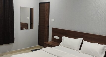 KAMADHENU COMFORTS Room Type - Double Deluxe AC Room